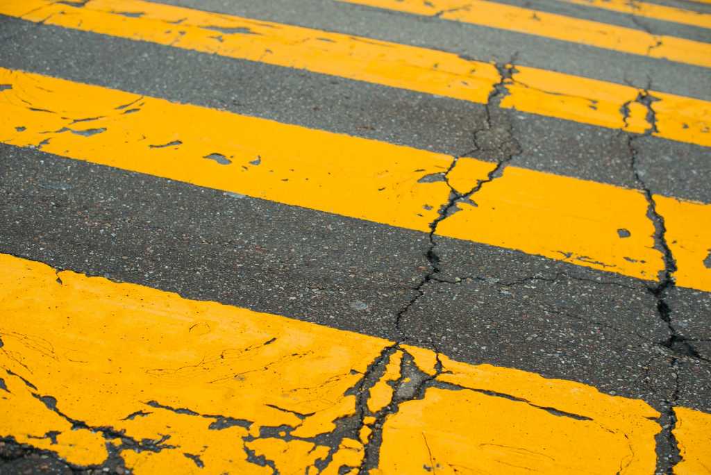 cracked yellow road markings